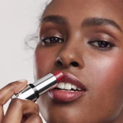 Kjaer Weis Tinted Lip Balm Refill -Fashion Makeup & Care Application Shot 01 1080x1080px Credo 230413